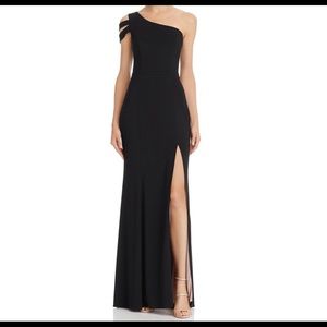 One shoulder black gown with slit. Worn once!